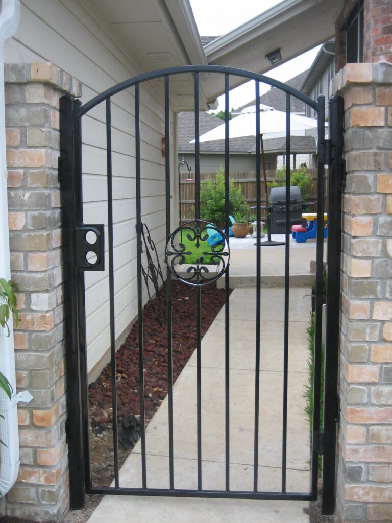 Custom arched gate with rosette