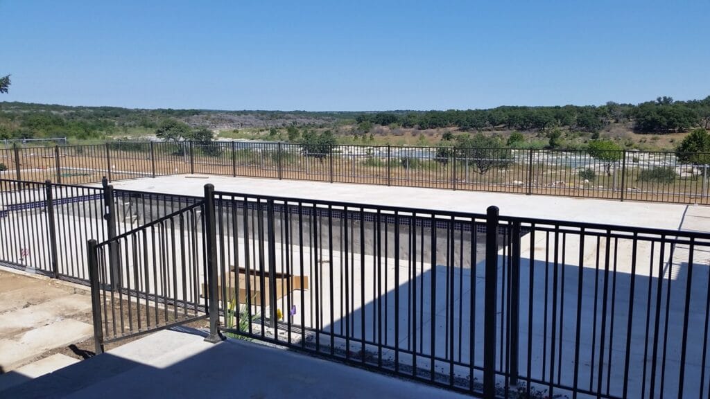 Ornamental Steel Railing and Fencing for a Pool
