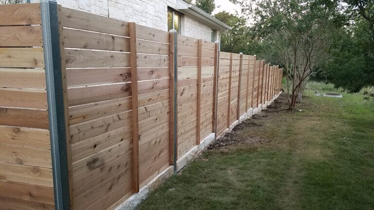 Cedar Privacy fence with limestone base