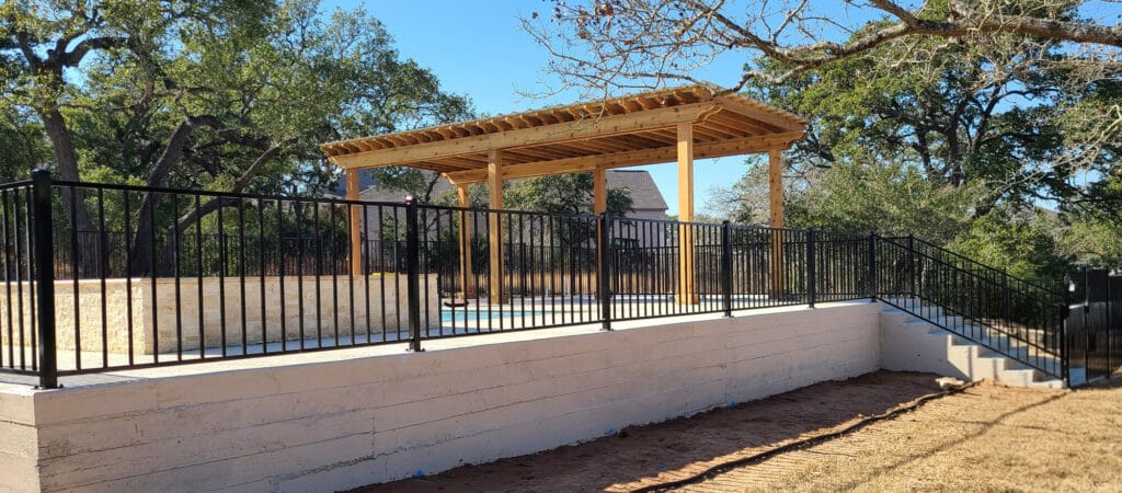 Pool railing installed for an elevated pool, designed and built by Sierra Fence in Central Texas.