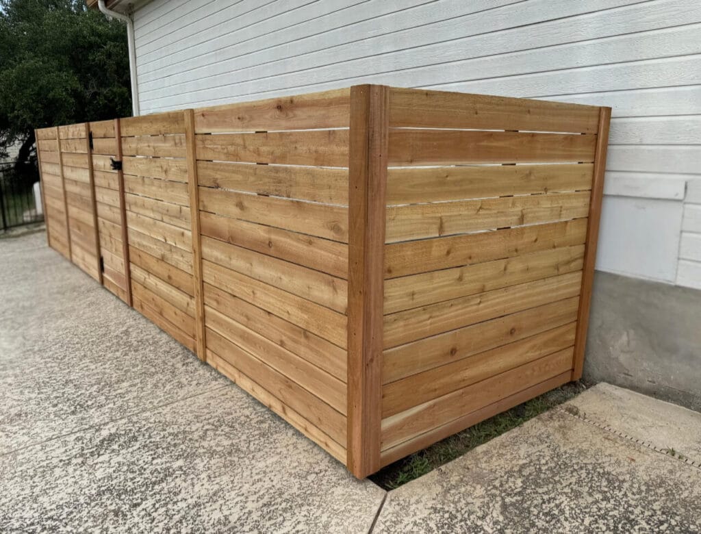 Pool equipment enclosure built by Sierra Fence in Central Texas for clean, secure equipment storage.