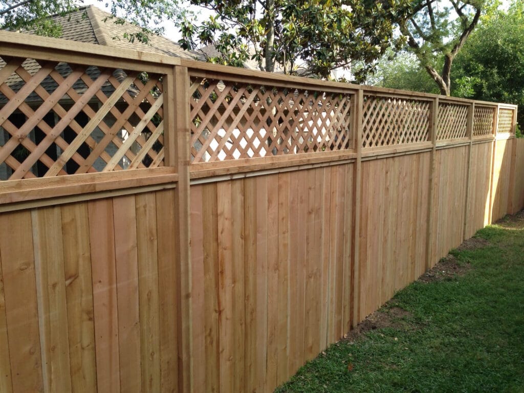 Cedar privacy fence with lattice top for extra height and visual interest