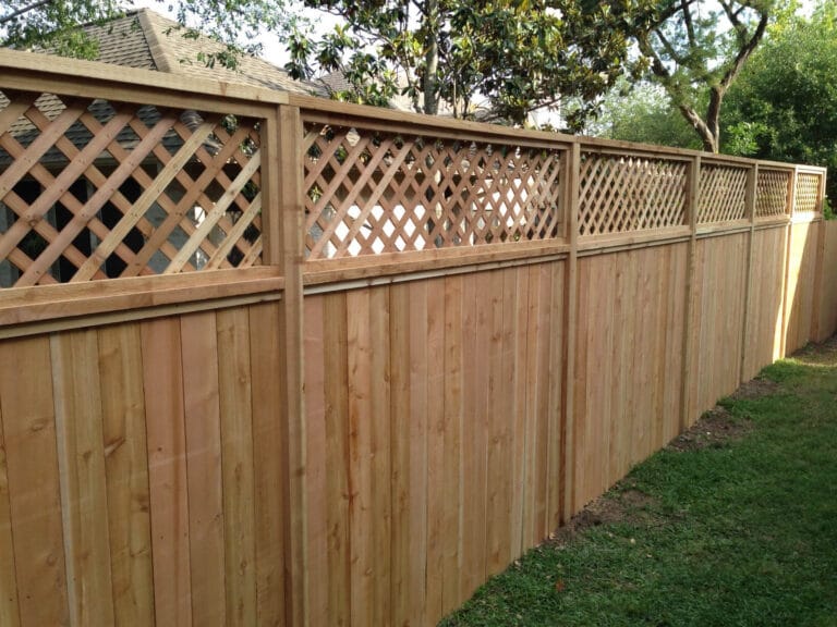 Cedar privacy fence with lattice top for extra height and visual interest