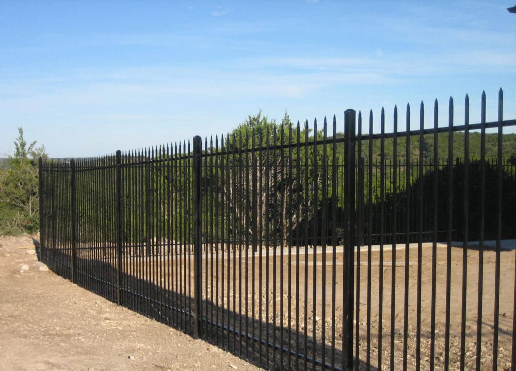 Pressed-point picket steel fence providing decorative 6-ft security