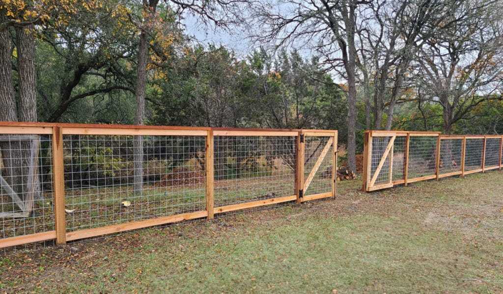 Cedar-framed cattle panel fencing combining rustic design with long-lasting durability.