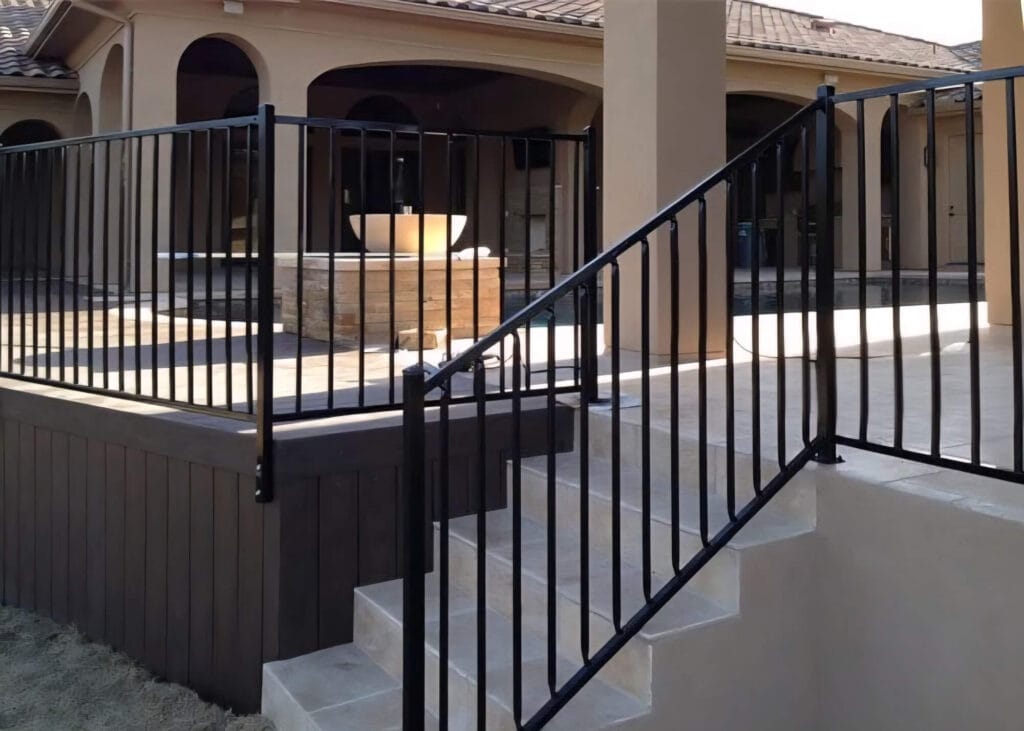 Custom iron pool-deck and staircase railing with modern safety features