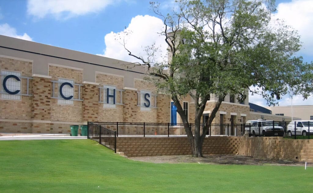 Steel safety railing at Cedar Creek High School ensuring safe pedestrian walkways.