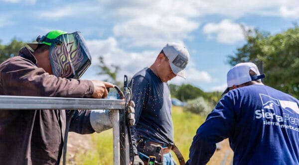 Sierra Fence workers during a fence installation in Texas