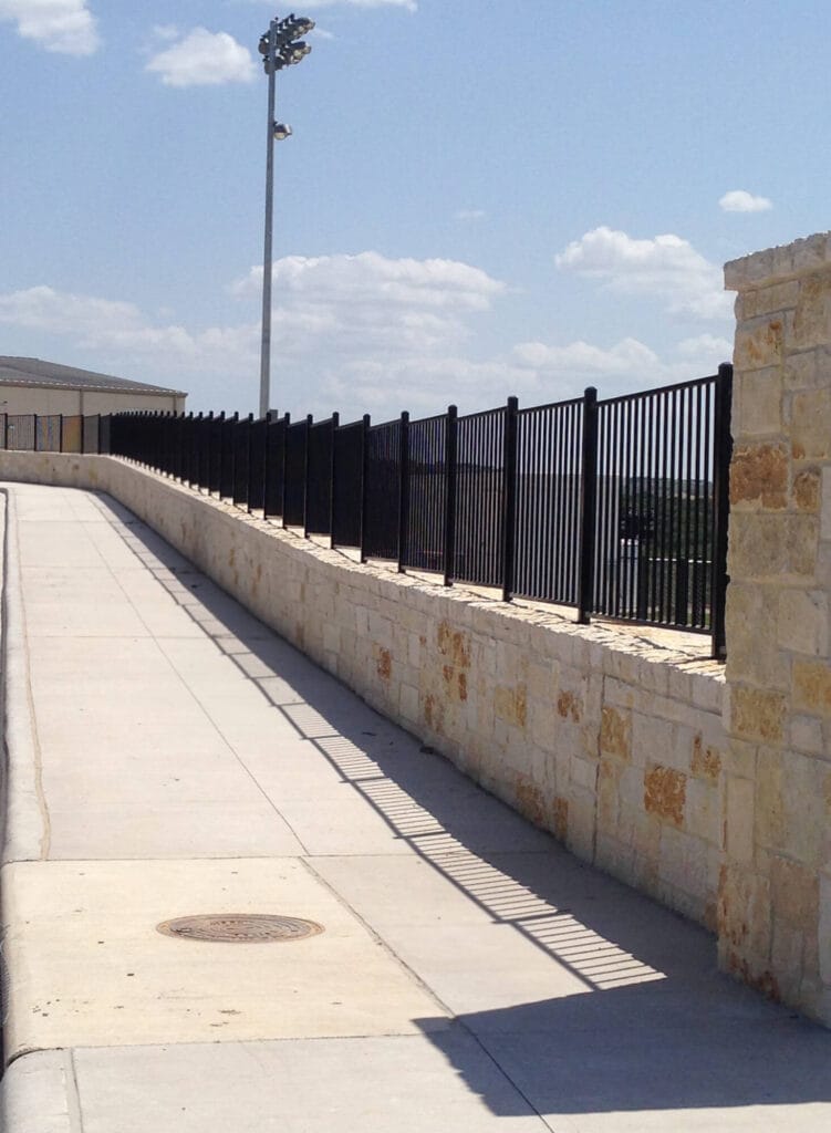 Stadium walkway ornamental steel fencing offering durable, attractive spectator safety barrier.